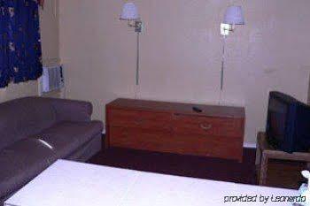 Budget Host Frontier Inn Сузанвилл Экстерьер фото